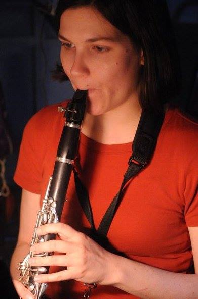 Brenda Buys playing a clarinet